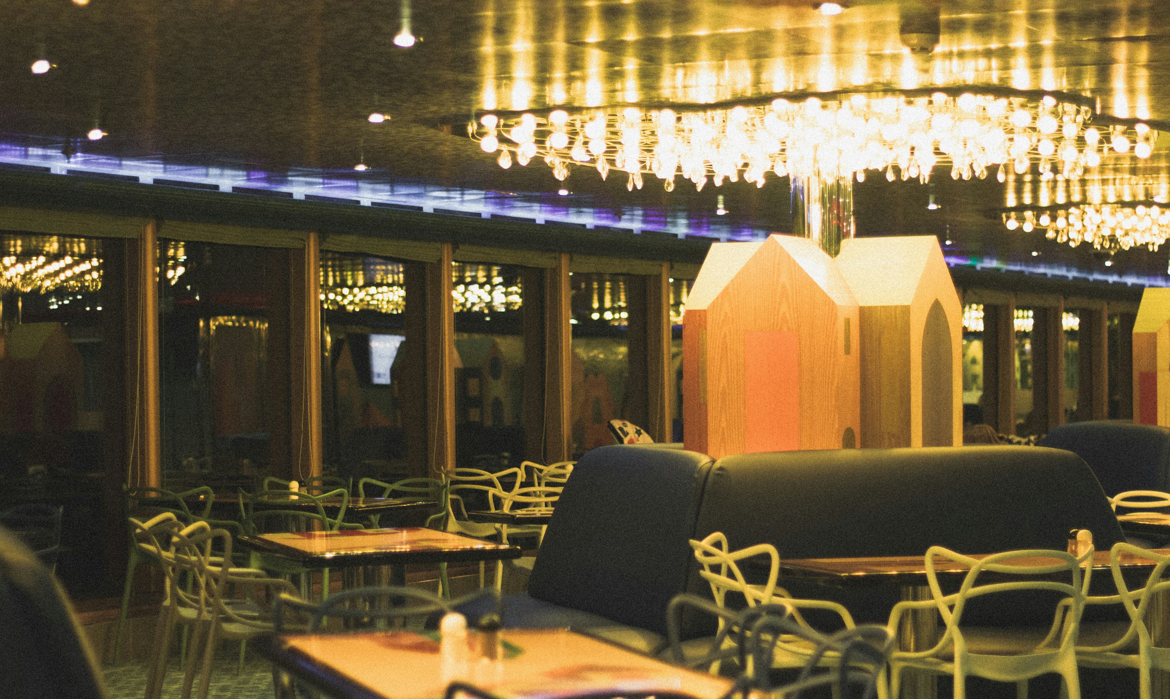 Warm, softly lit restaurant dining room